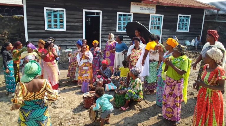 Women assemble in front of the Wmen’s Training Center